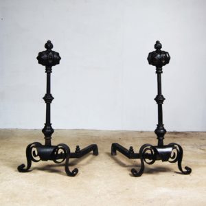 A pair of large cast and wrought iron Renaissance revival fire dogs-0