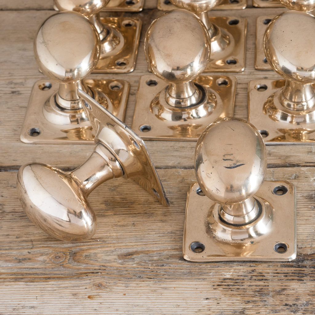 Early twentieth century rose brass door knobs,
