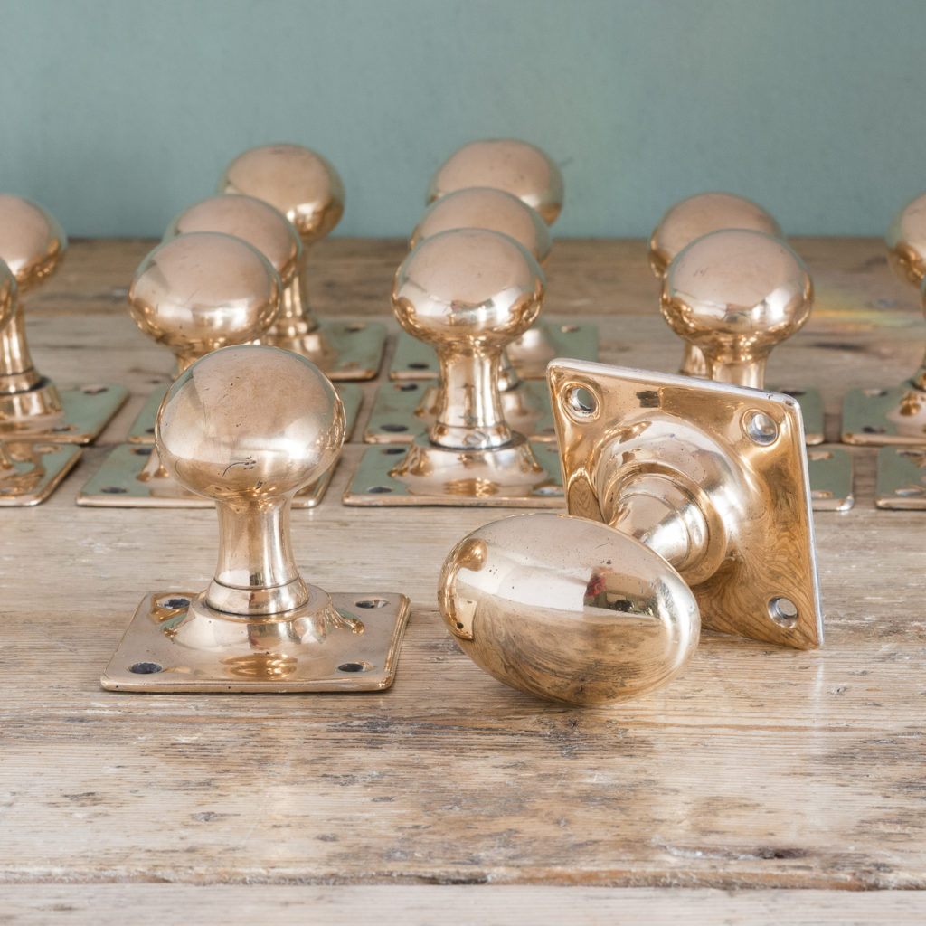 Early twentieth century rose brass door knobs,