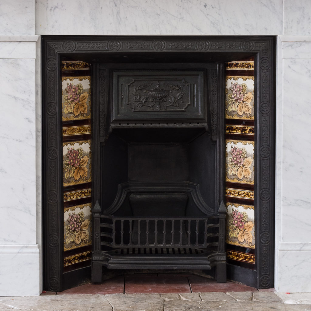 Late Victorian carrara marble chimneypiece and cast iron insert,