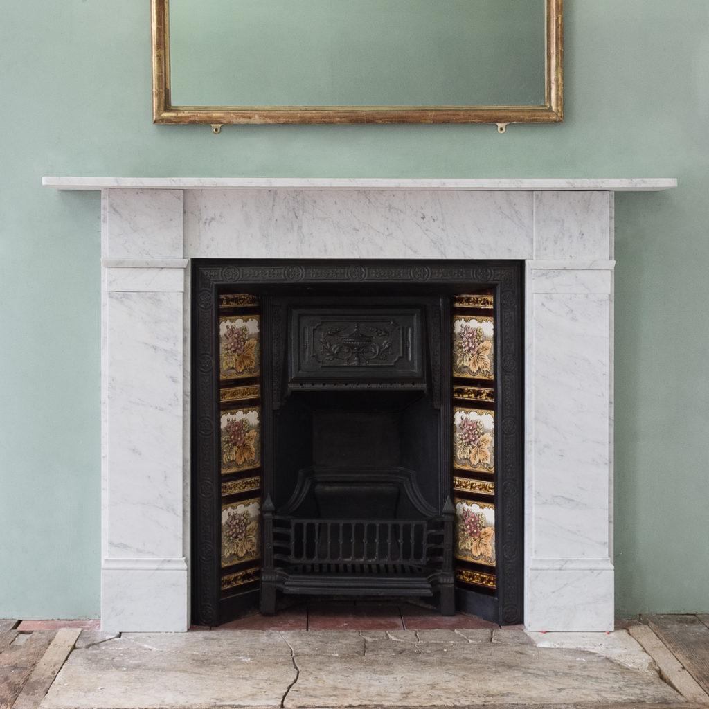 Late Victorian carrara marble chimneypiece and cast iron insert,