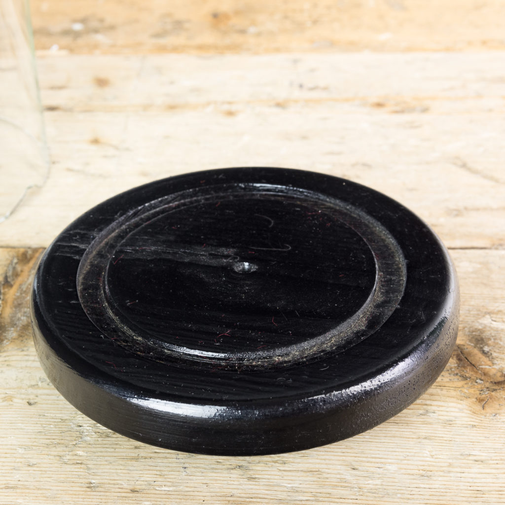 on ebonised base