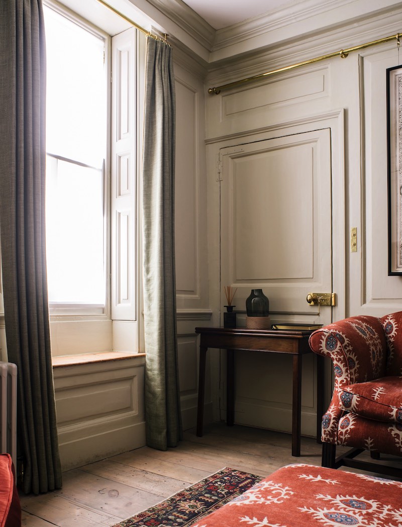 Period panelling showcases a well dressed interior complimented by reclaimed Georgian pine