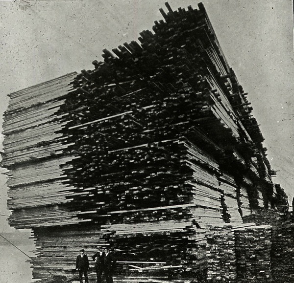 Large stack of reclaimed pine in Victorian times