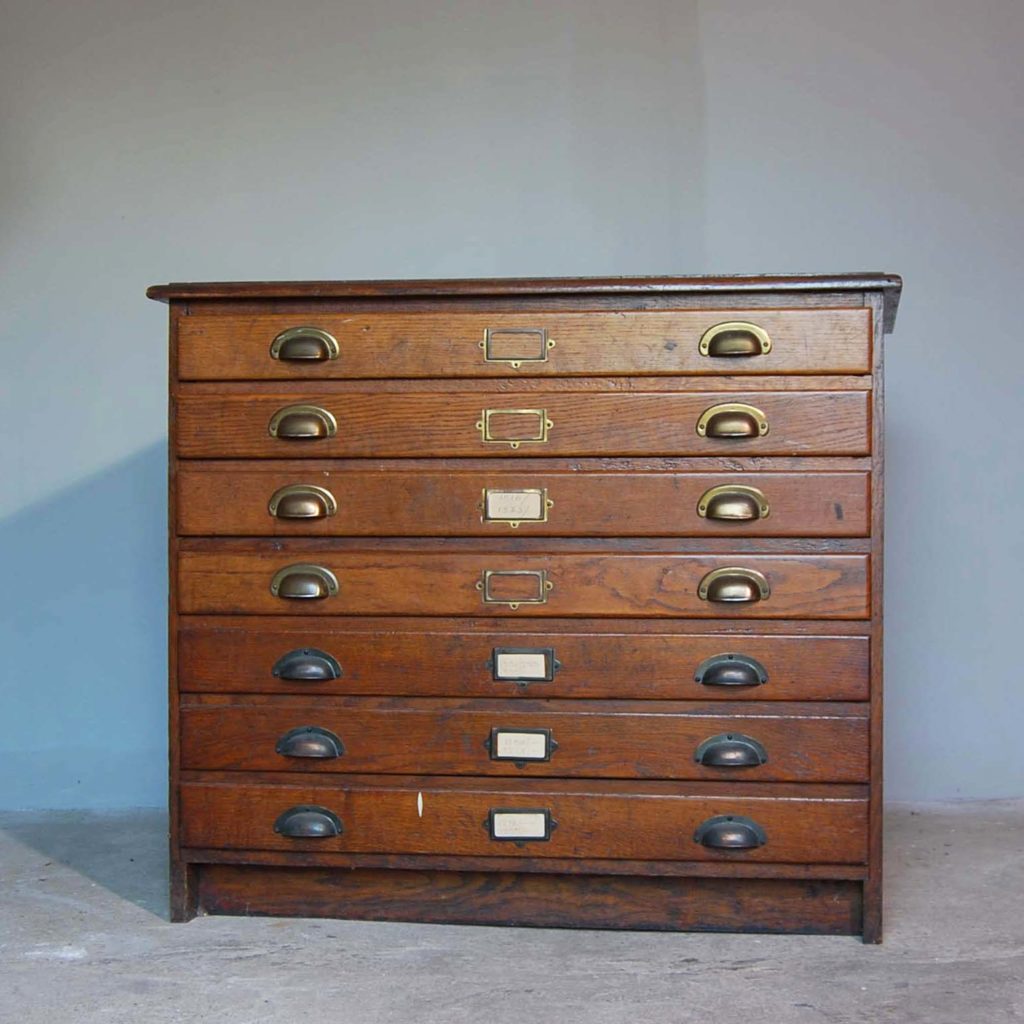 An English oak seven drawer plan chest,-0