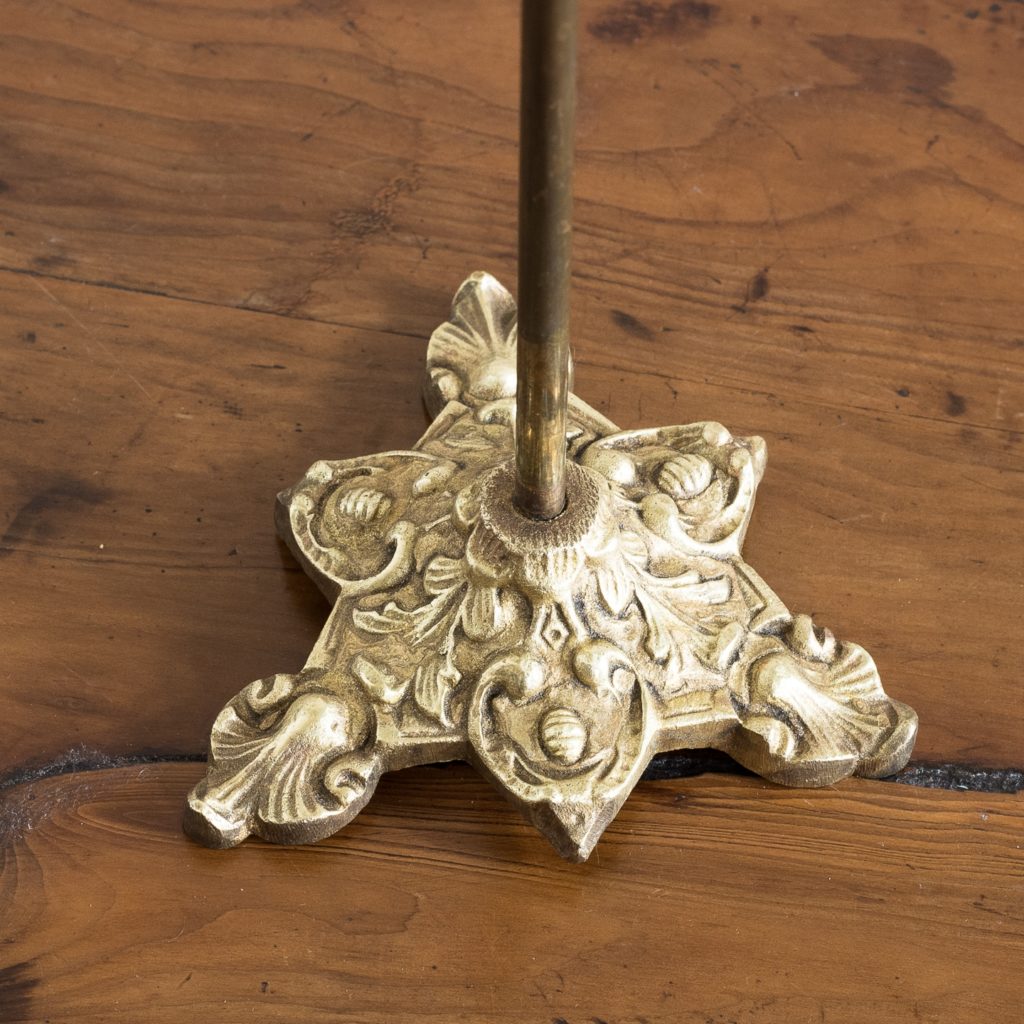 ornate gilt-metal triform base