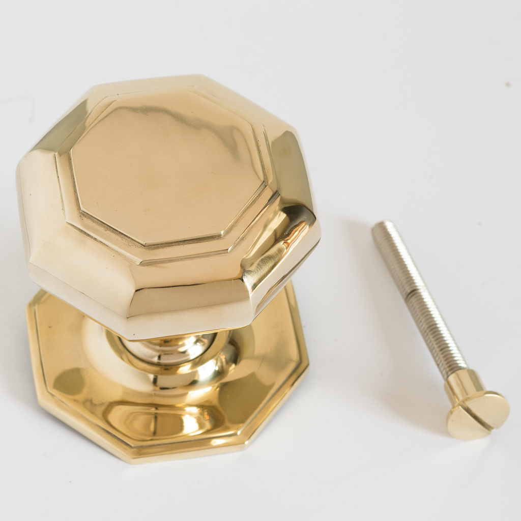 Large octagonal brass centre door pull,