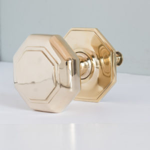 Large octagonal brass centre door pull,