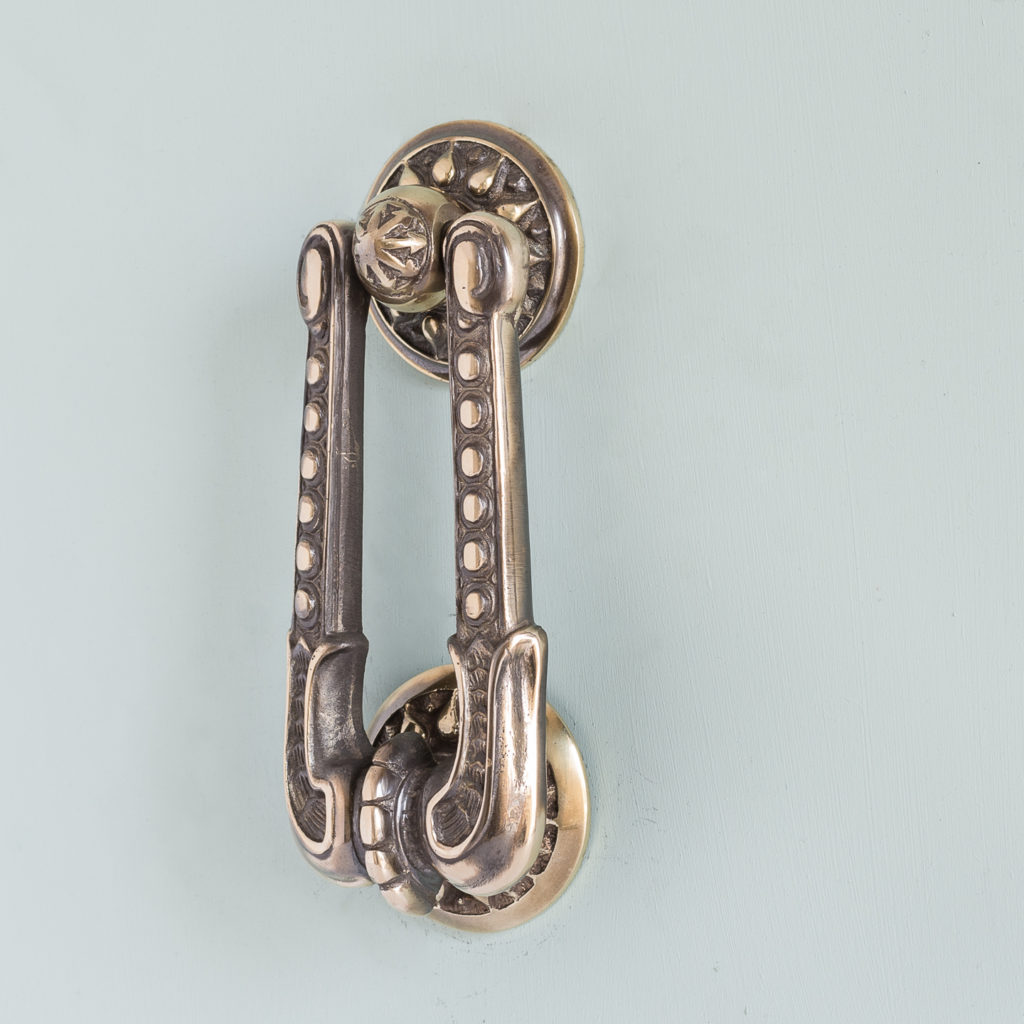 Nineteenth century style brass door knocker,