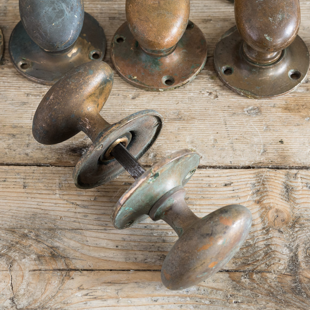 oval door knobs on circular backplates