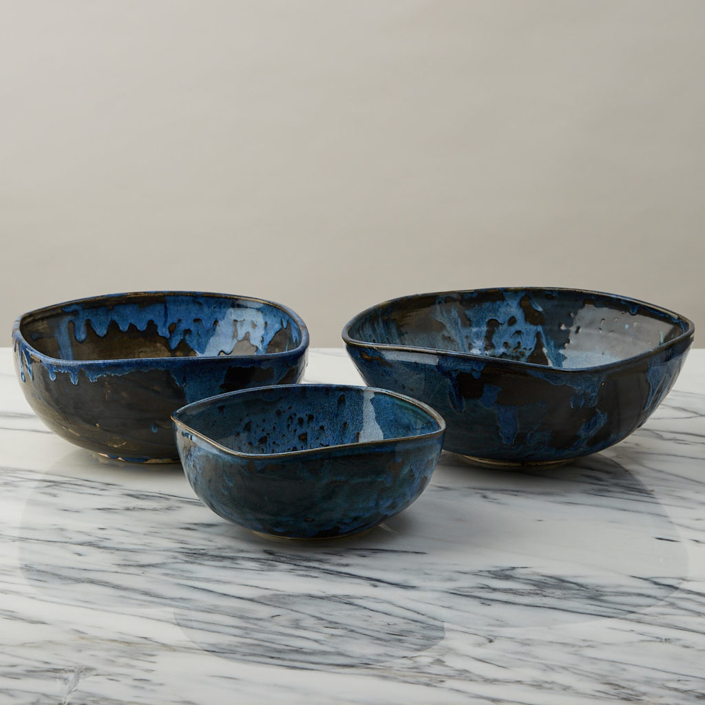 A nesting set of ceramic bowls,-127351