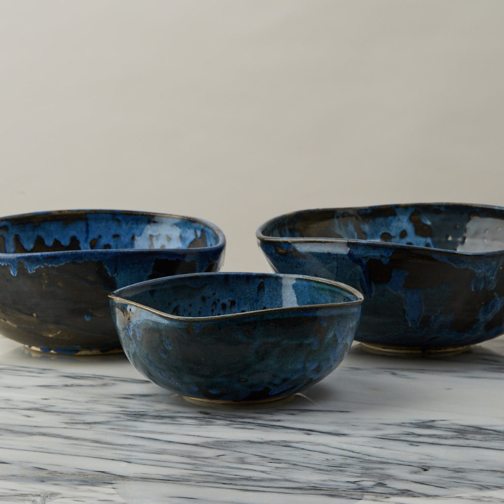 A nesting set of ceramic bowls,-127349