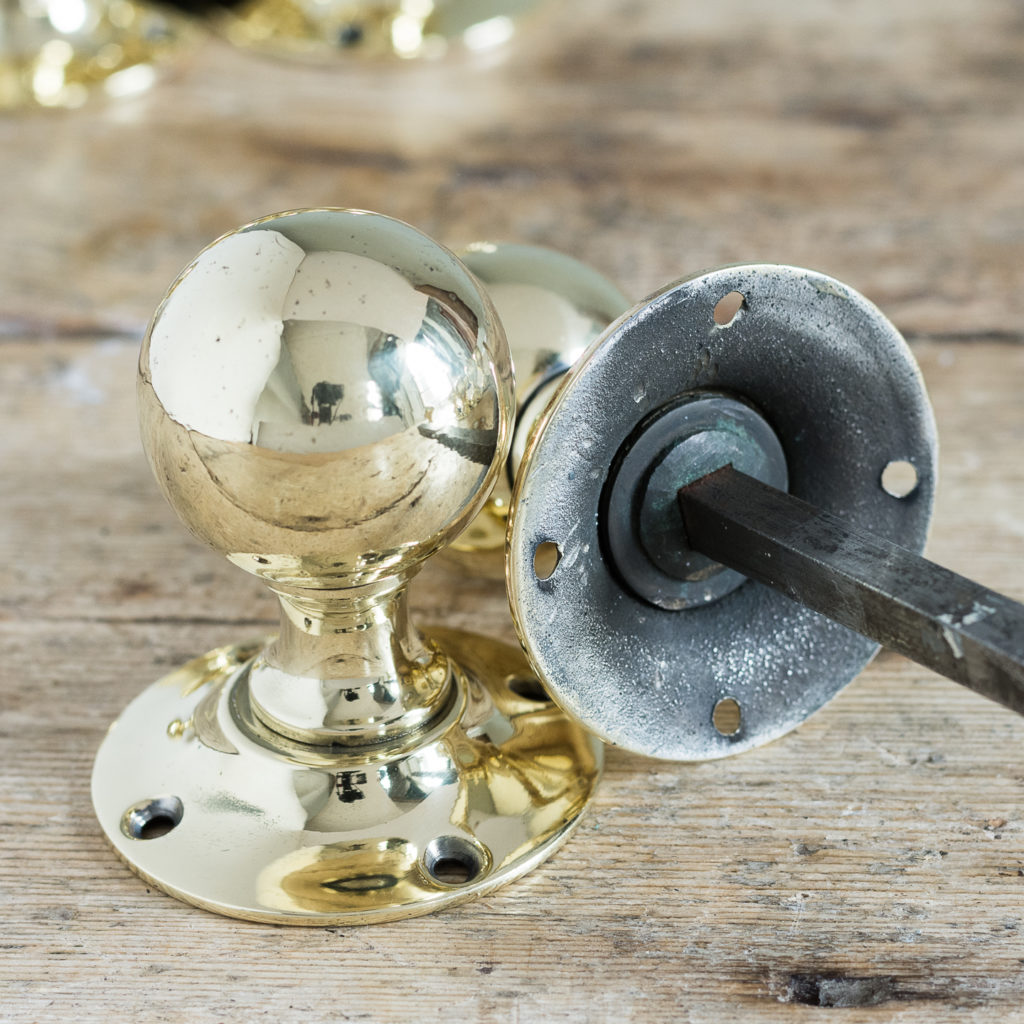 Antique spherical brass door knobs,