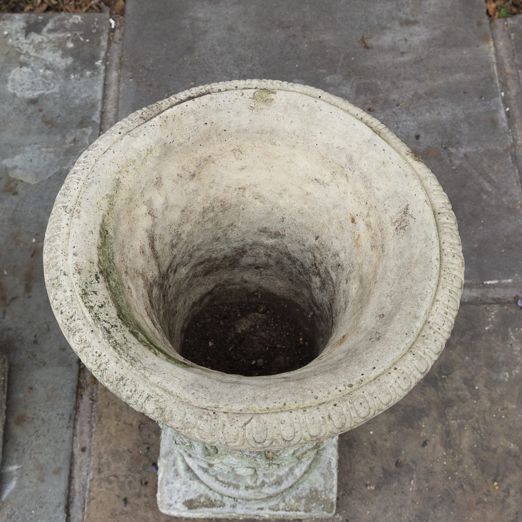 Pair of reconstituted stone Medici urns,-127521