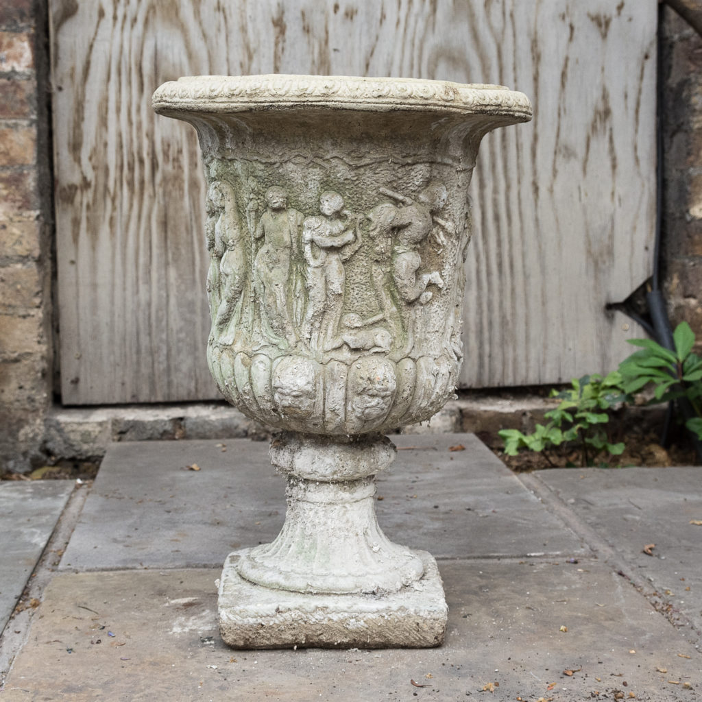 Pair of reconstituted stone Medici urns,