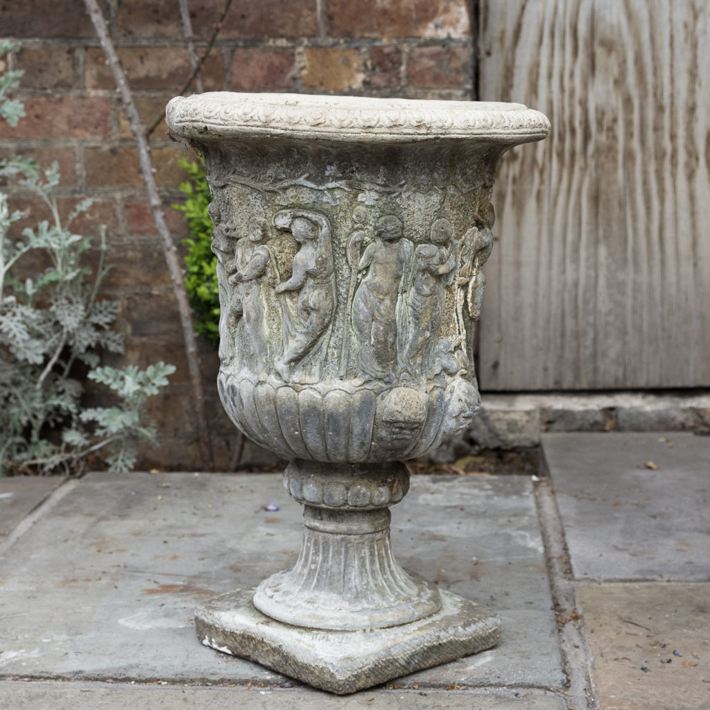 Pair of reconstituted stone Medici urns,