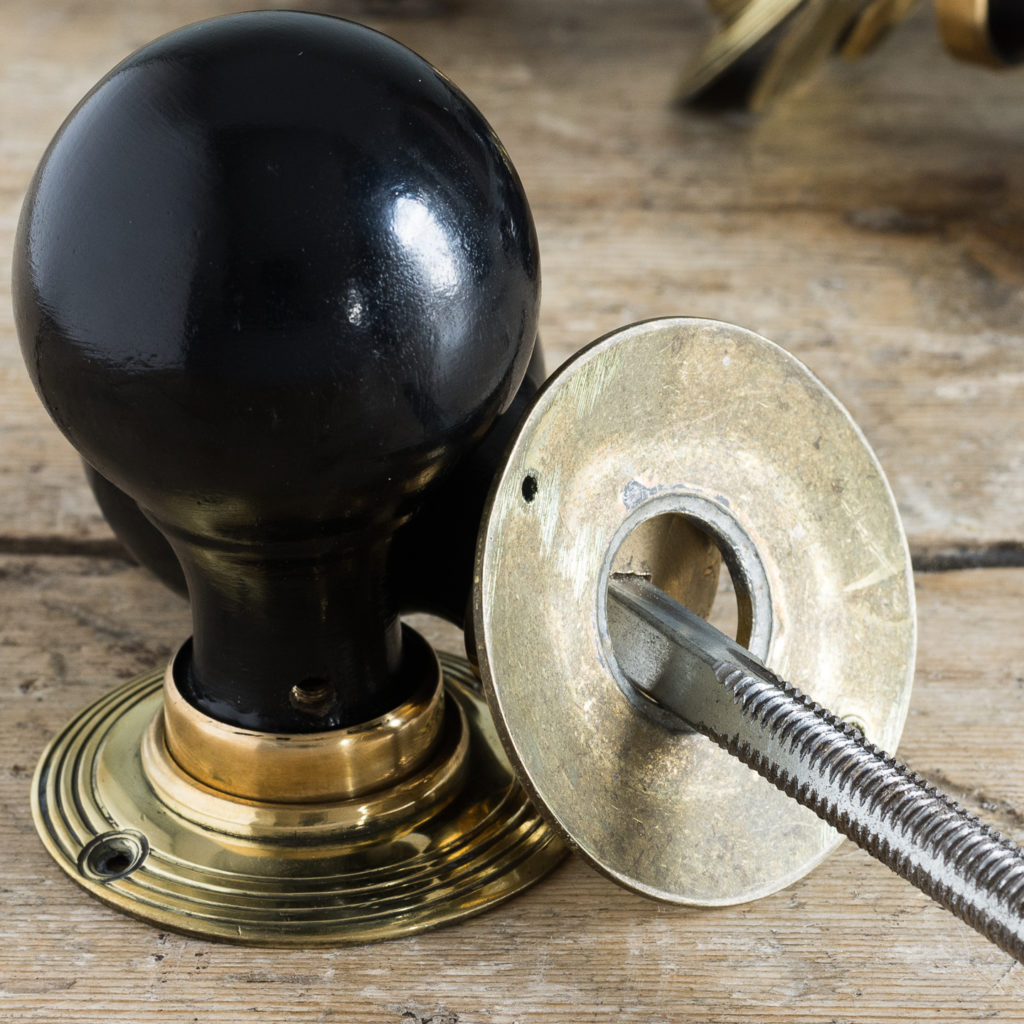 Victorian style spherical ebonised door knobs,