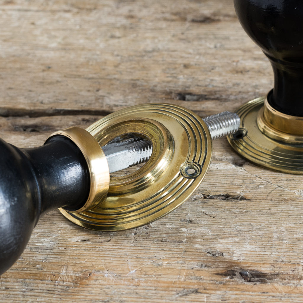 Victorian style spherical ebonised door knobs,