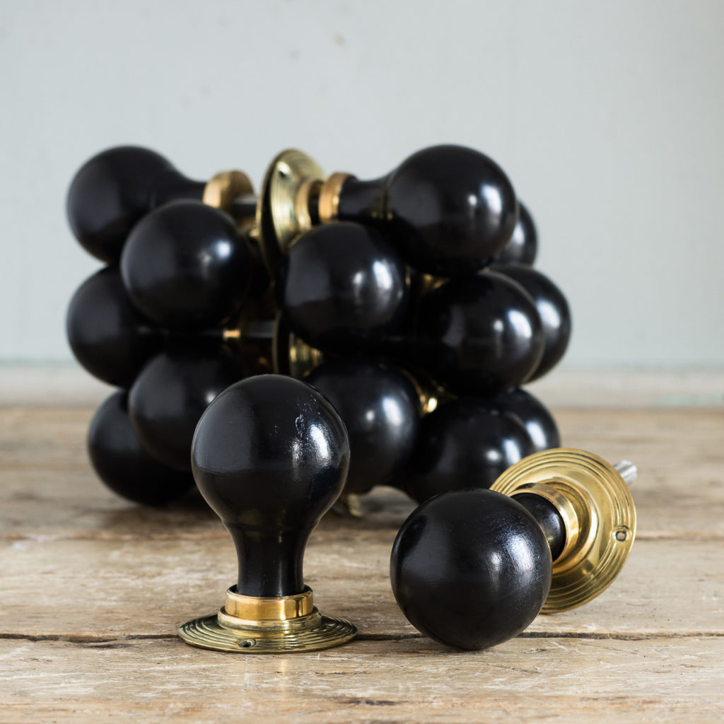 Victorian style spherical ebonised door knobs,