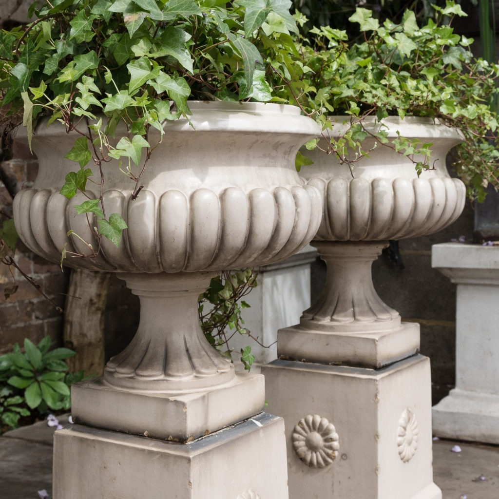 Pair of Victorian glazed terracotta tazza urns with pedestals,-127799