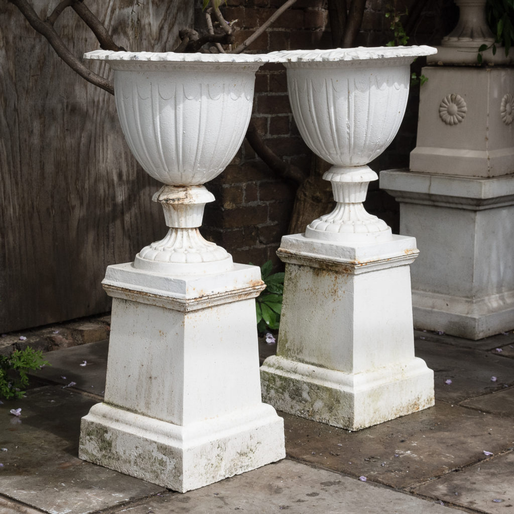 Pair of cast iron urns in the Classical Taste