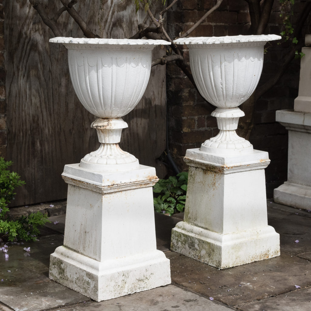 Pair of cast iron urns in the Classical Taste