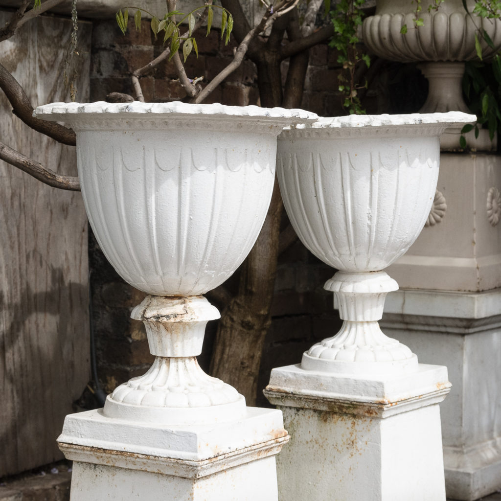 Pair of cast iron urns in the Classical Taste