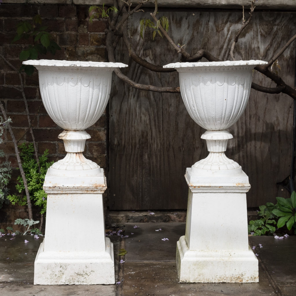 Pair of cast iron urns in the Classical Taste