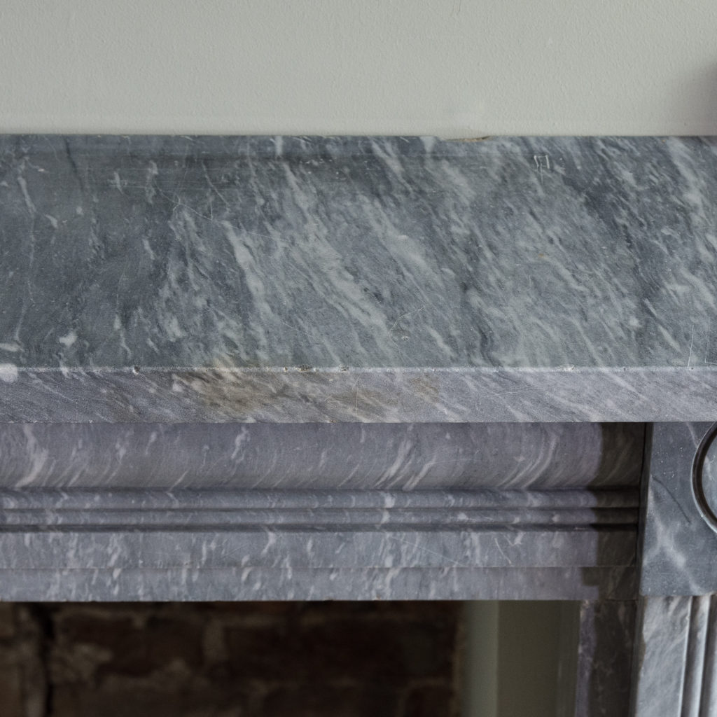 plain shelf above cushion moulded frieze