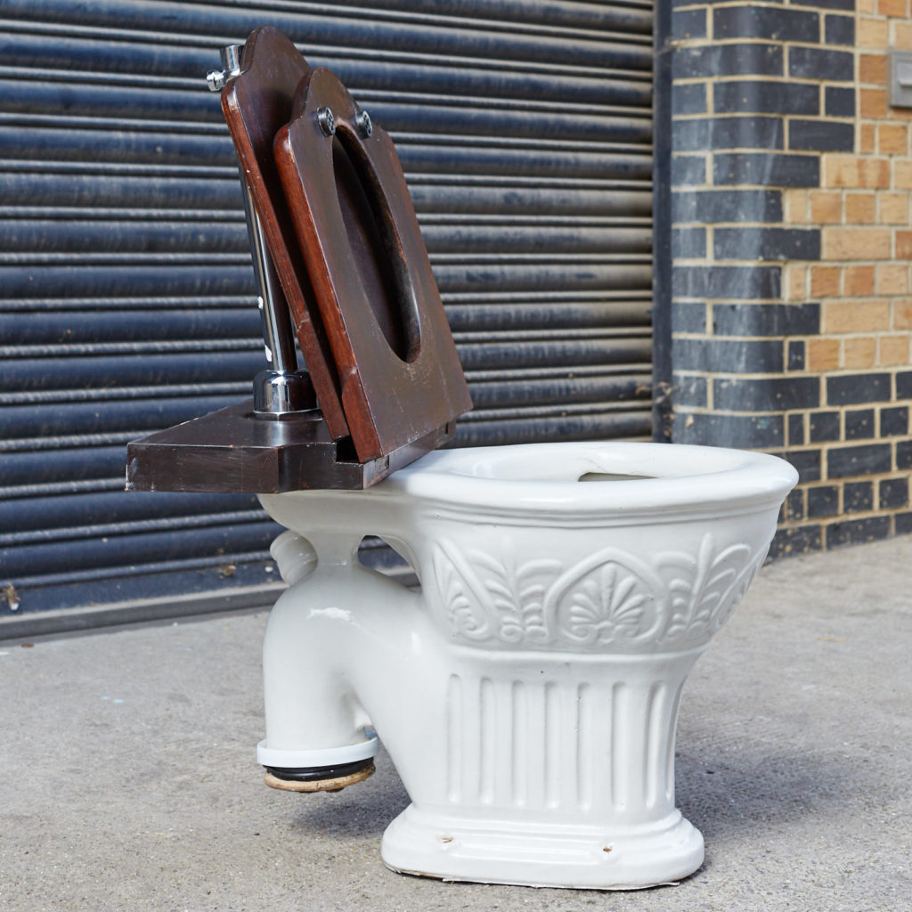 A hinged mahogany lavatory seat, -128350