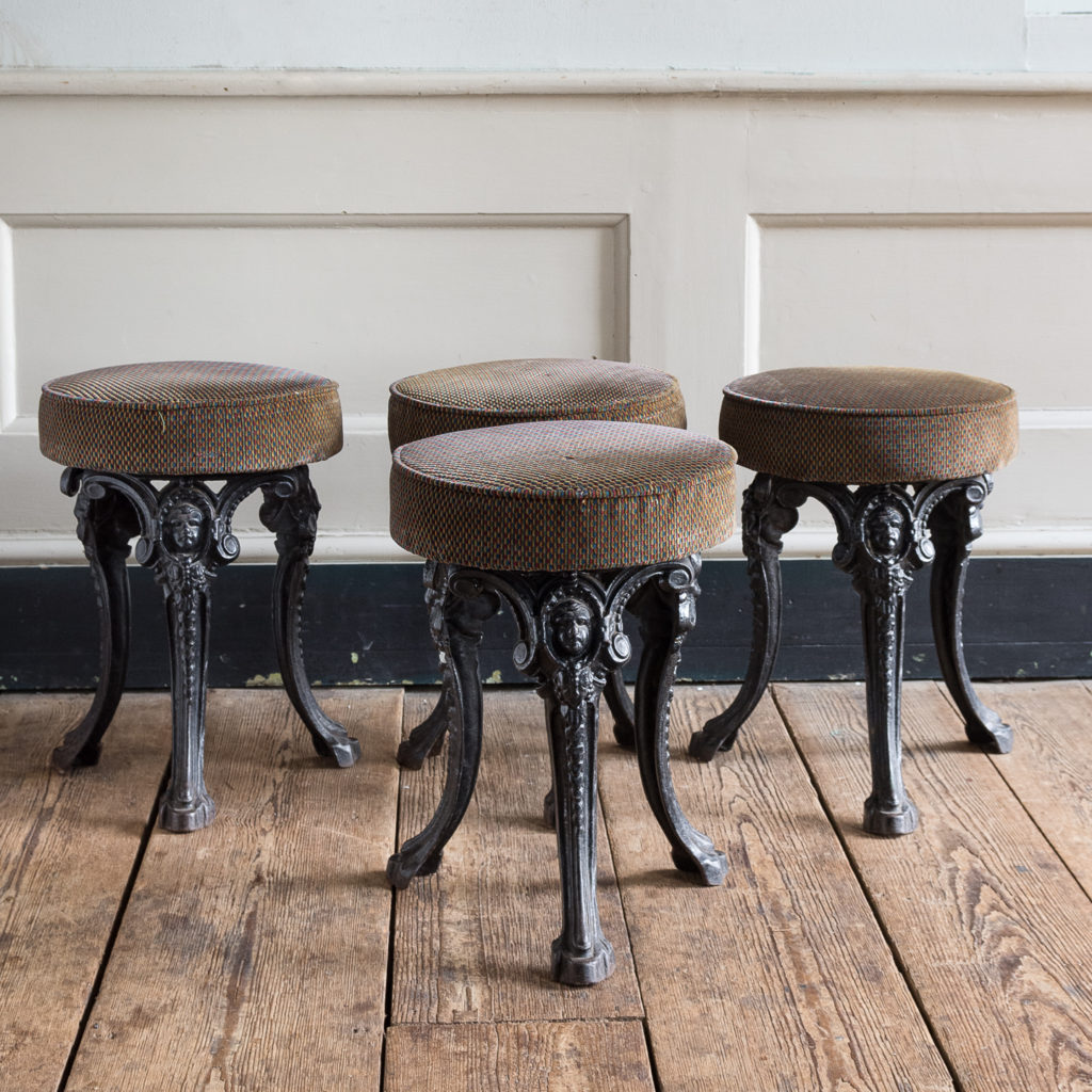 Cast iron pub stools,