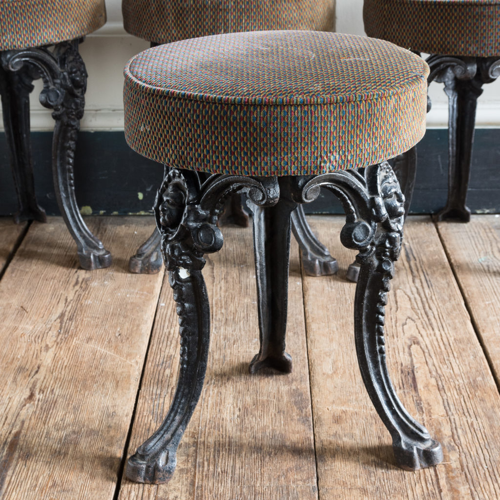 Cast iron pub stools,