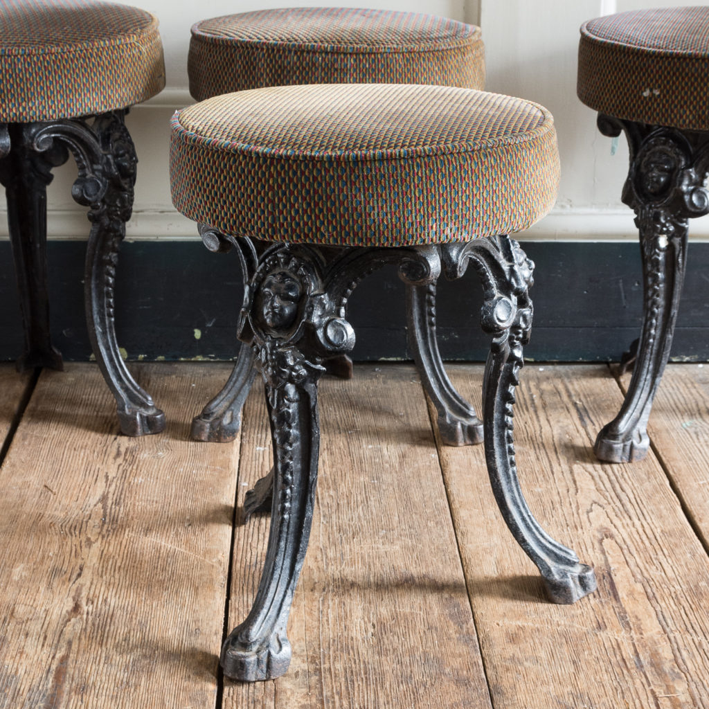 Cast iron pub stools,