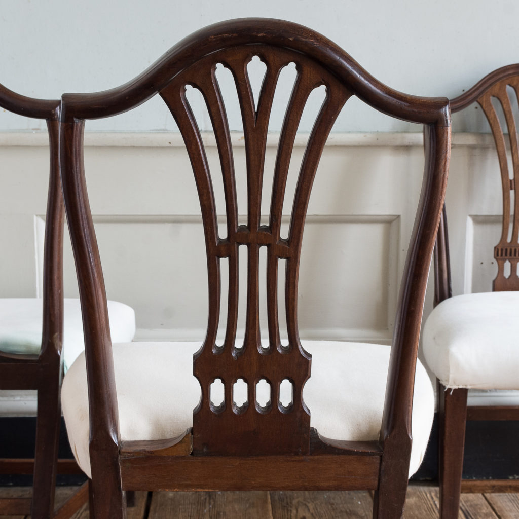 Three George III mahogany dining chairs,-128913