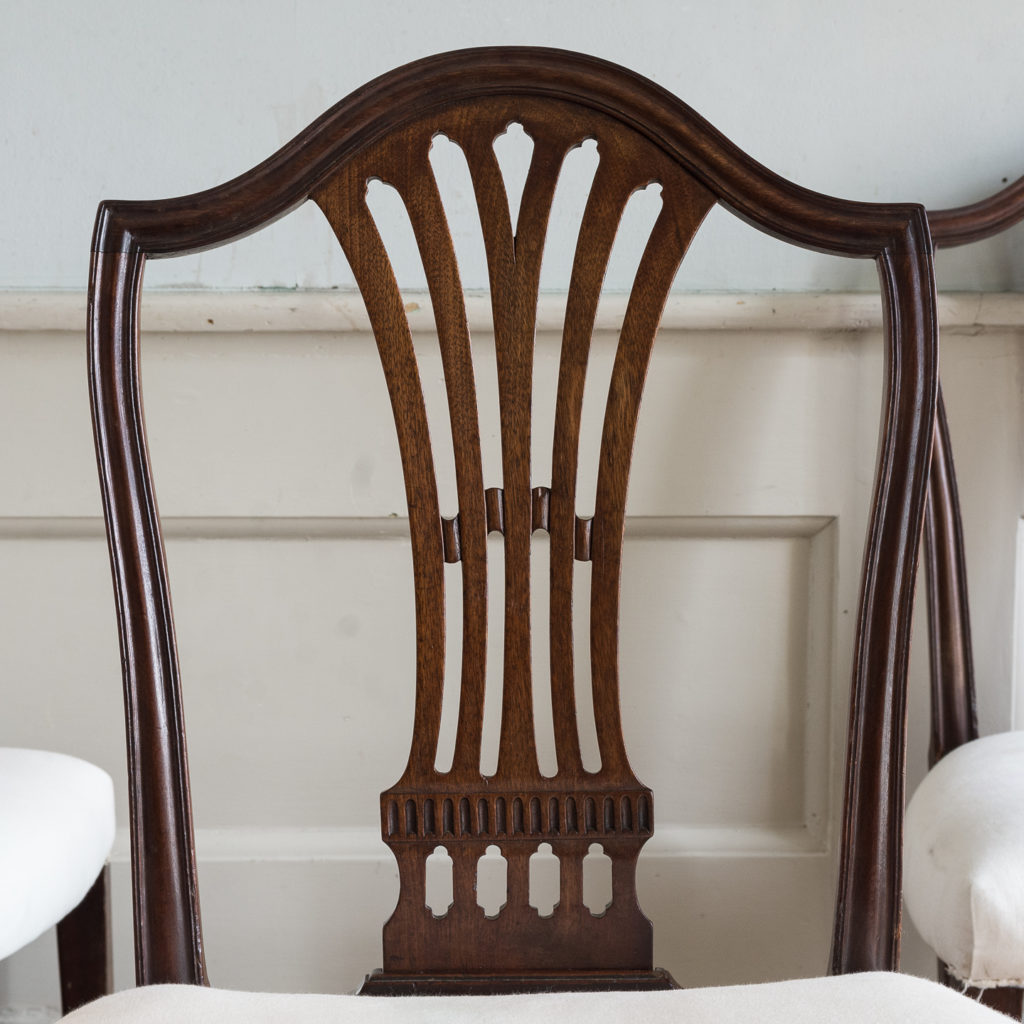 Three George III mahogany dining chairs,-128916