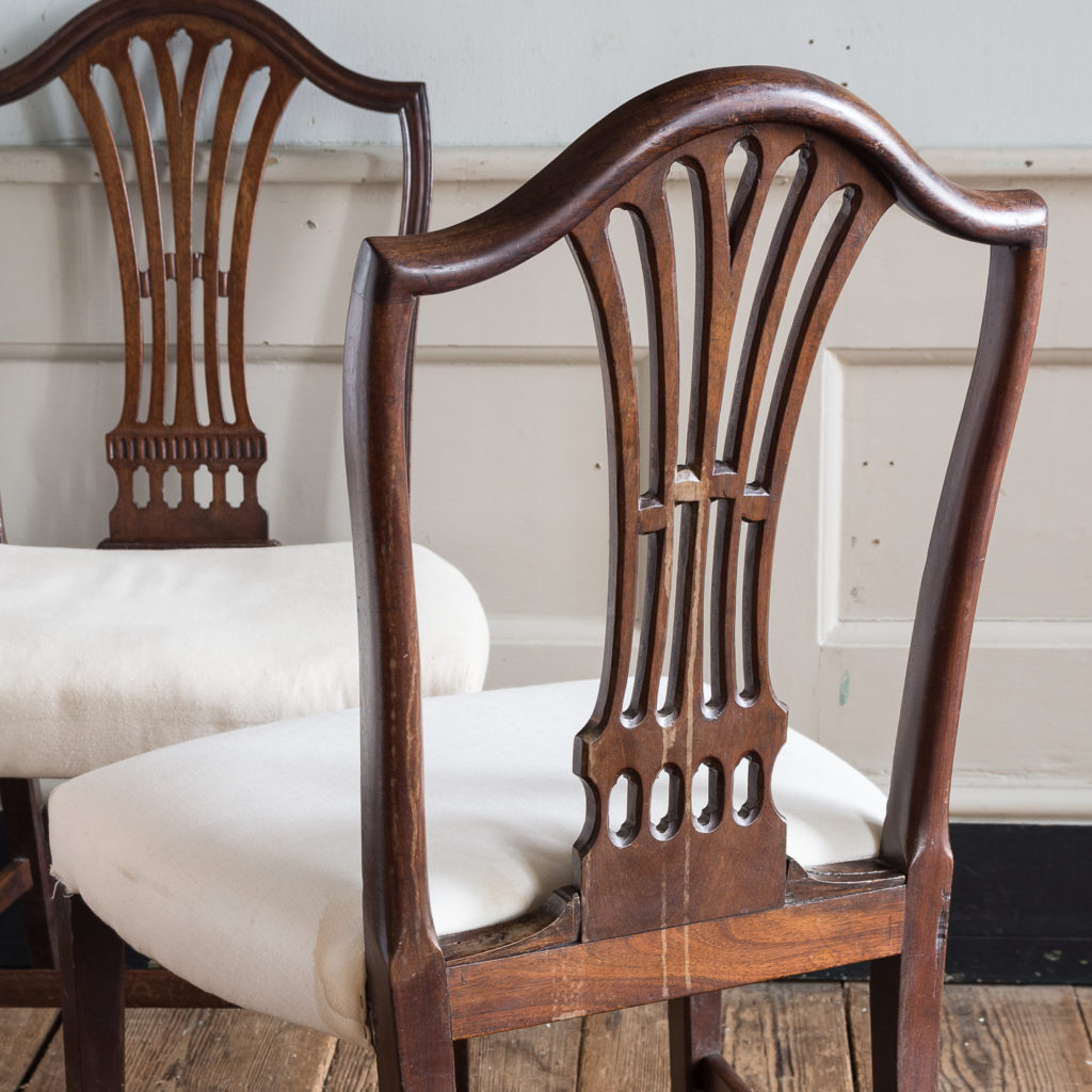 Three George III mahogany dining chairs,-128926