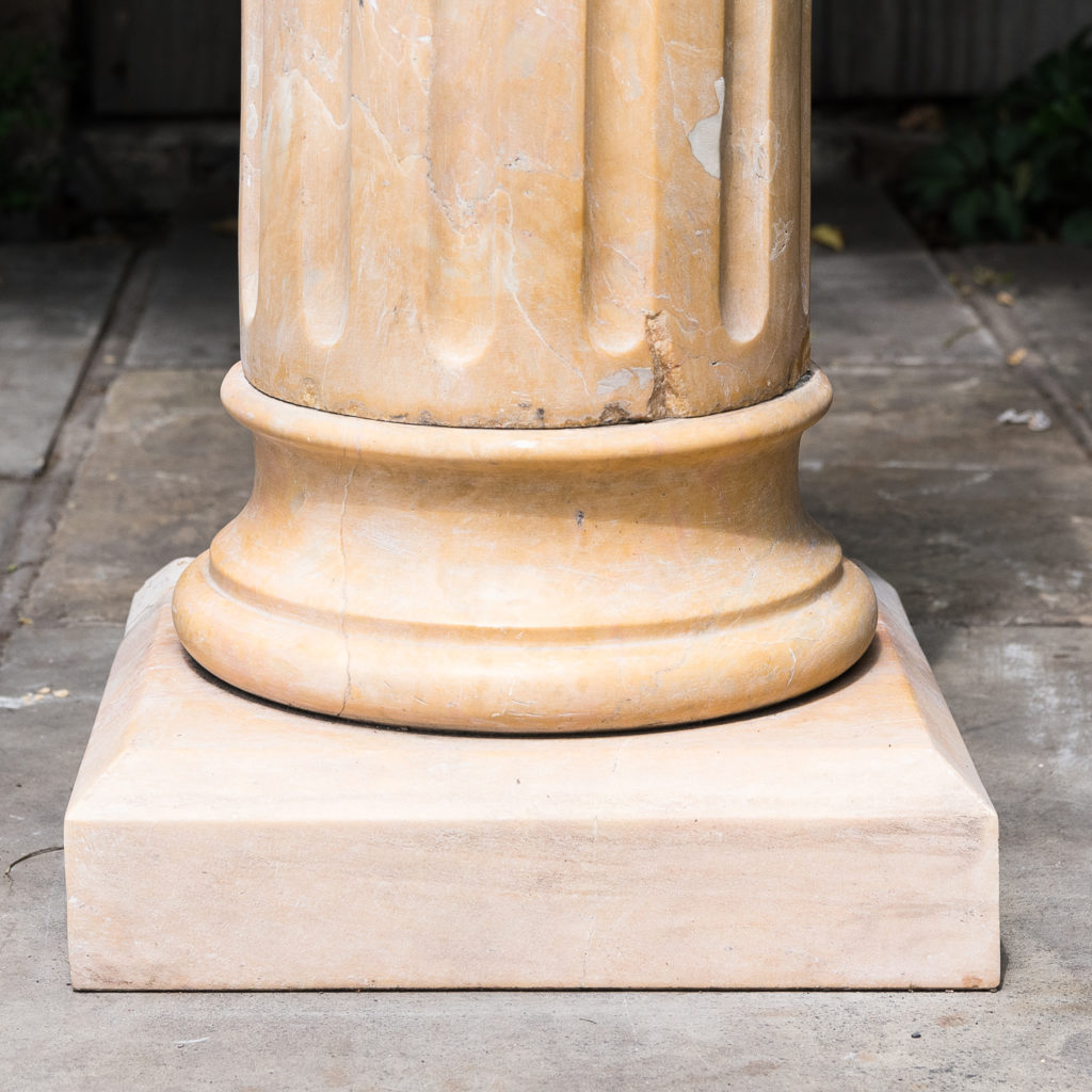 Four Valence yellow marble pedestals, -128955