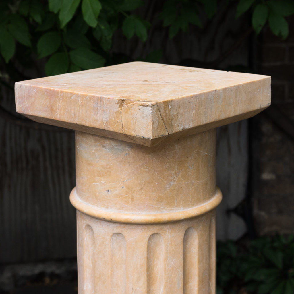 Four Valence yellow marble pedestals, -128948