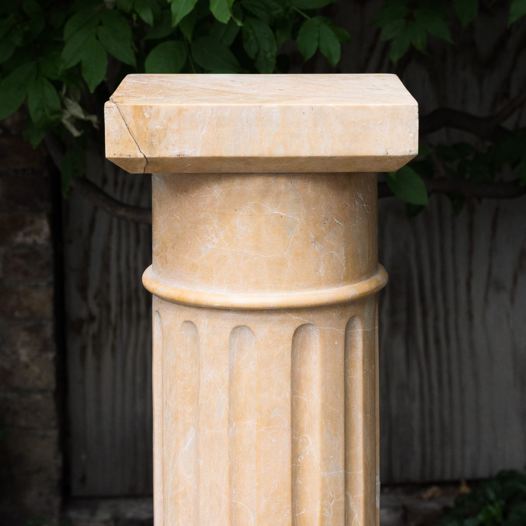 Four Valence yellow marble pedestals, -128949