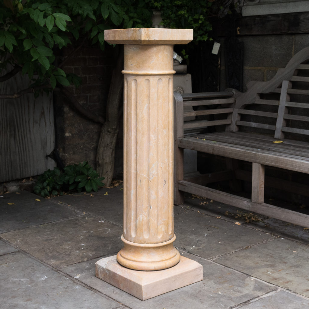 Four Valence yellow marble pedestals, -128951