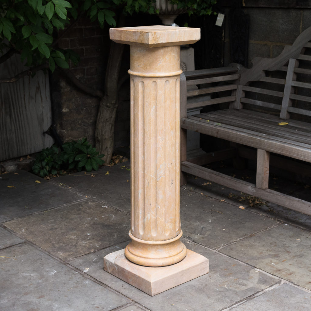 Four Valence yellow marble pedestals, -0