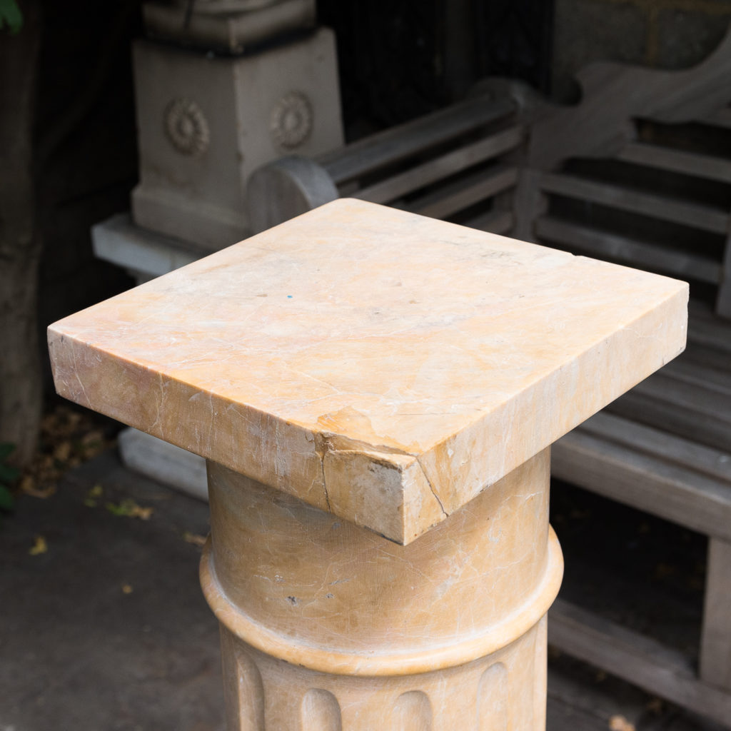 Four Valence yellow marble pedestals, -128953