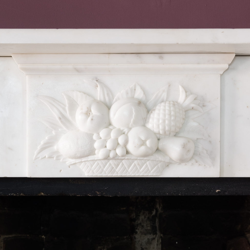 frieze with central tablet depicting a fruit bowl carved in relief