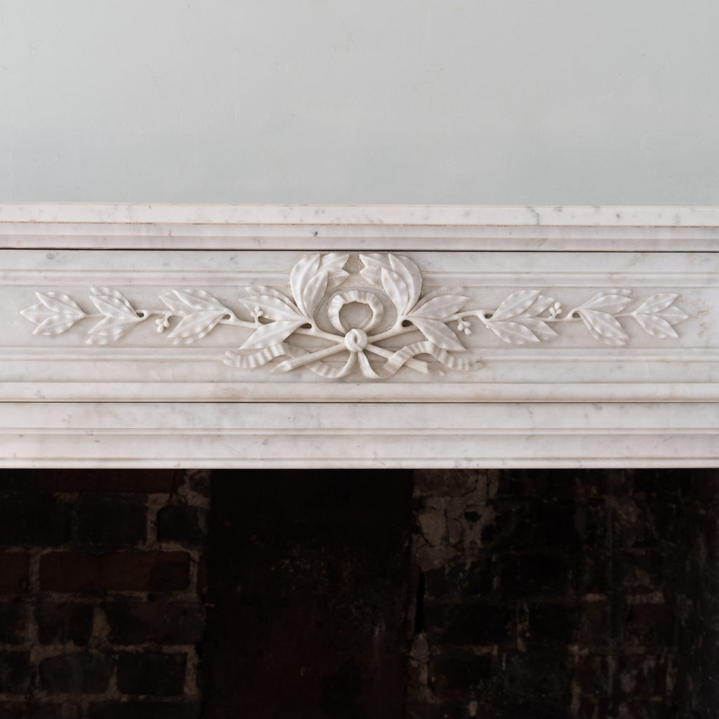 panelled frieze centred by laurel wreath