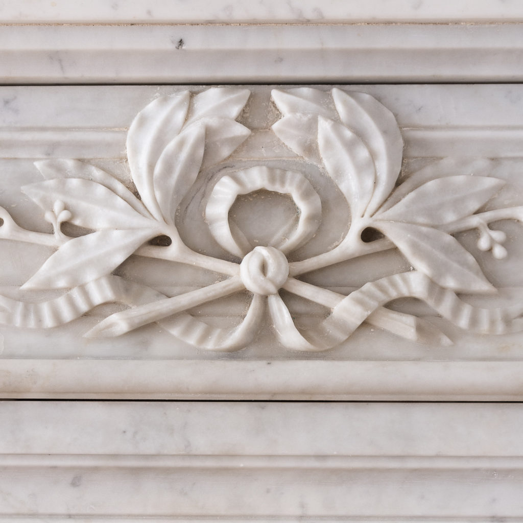 panelled frieze centred by laurel wreath