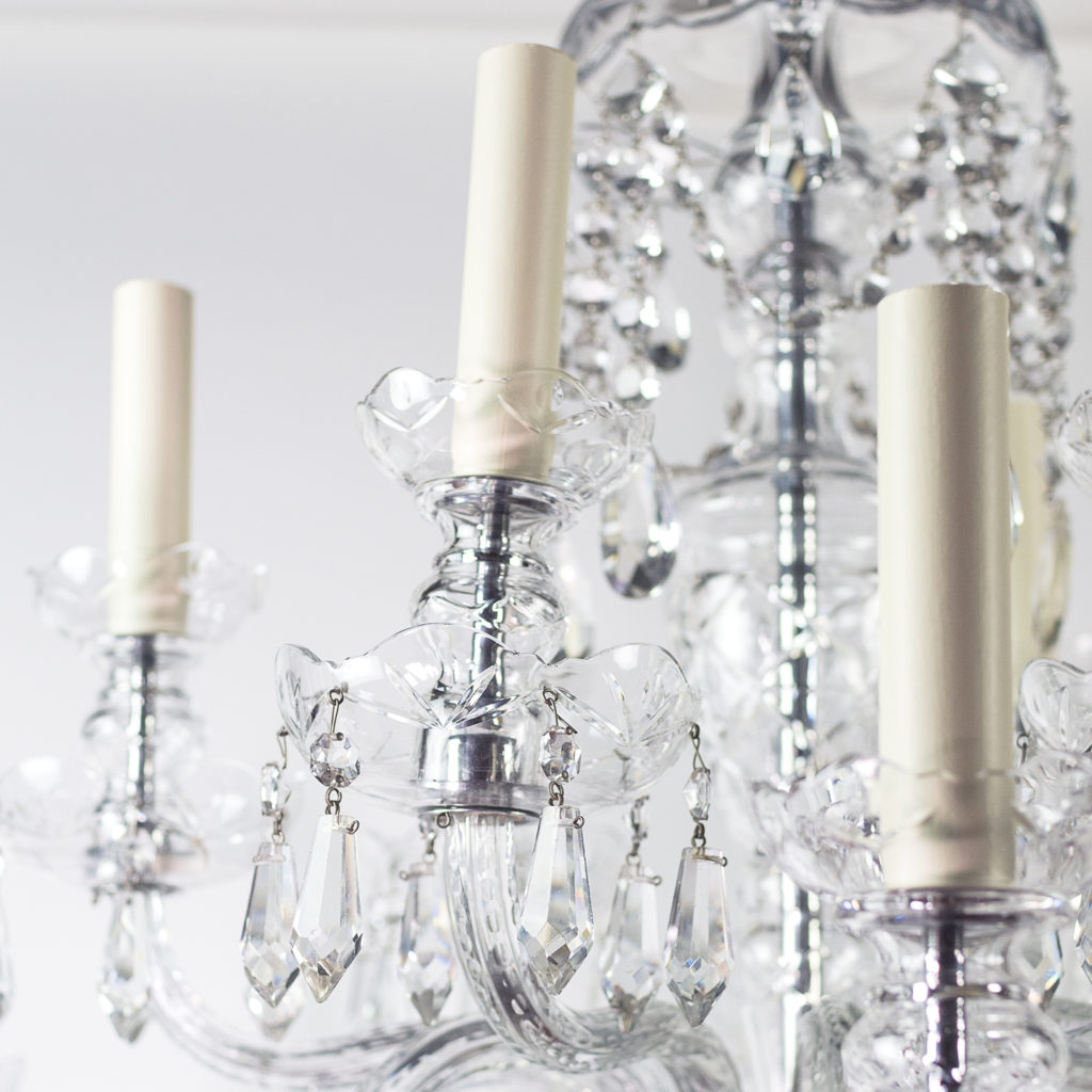 Two twentieth century cut and moulded glass twelve light chandeliers,-131575
