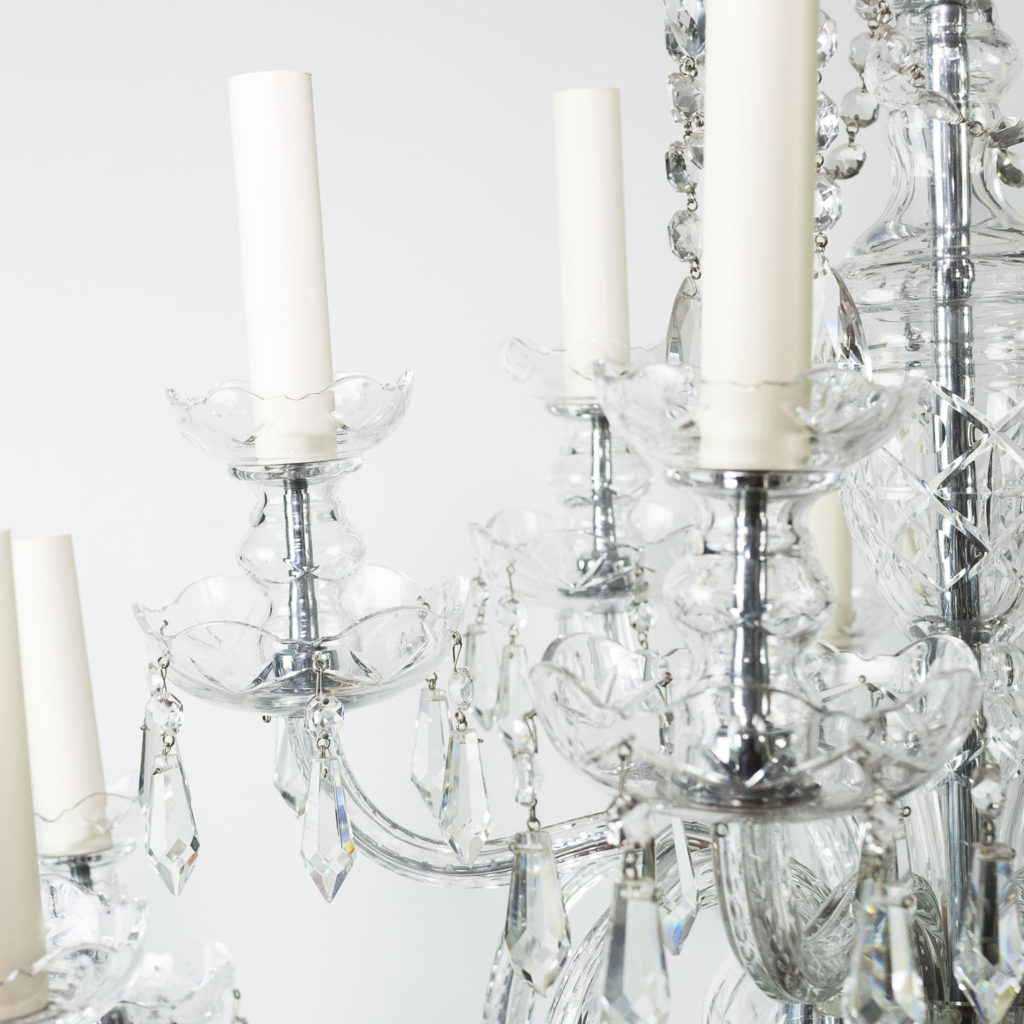 Two twentieth century cut and moulded glass twelve light chandeliers,-131574