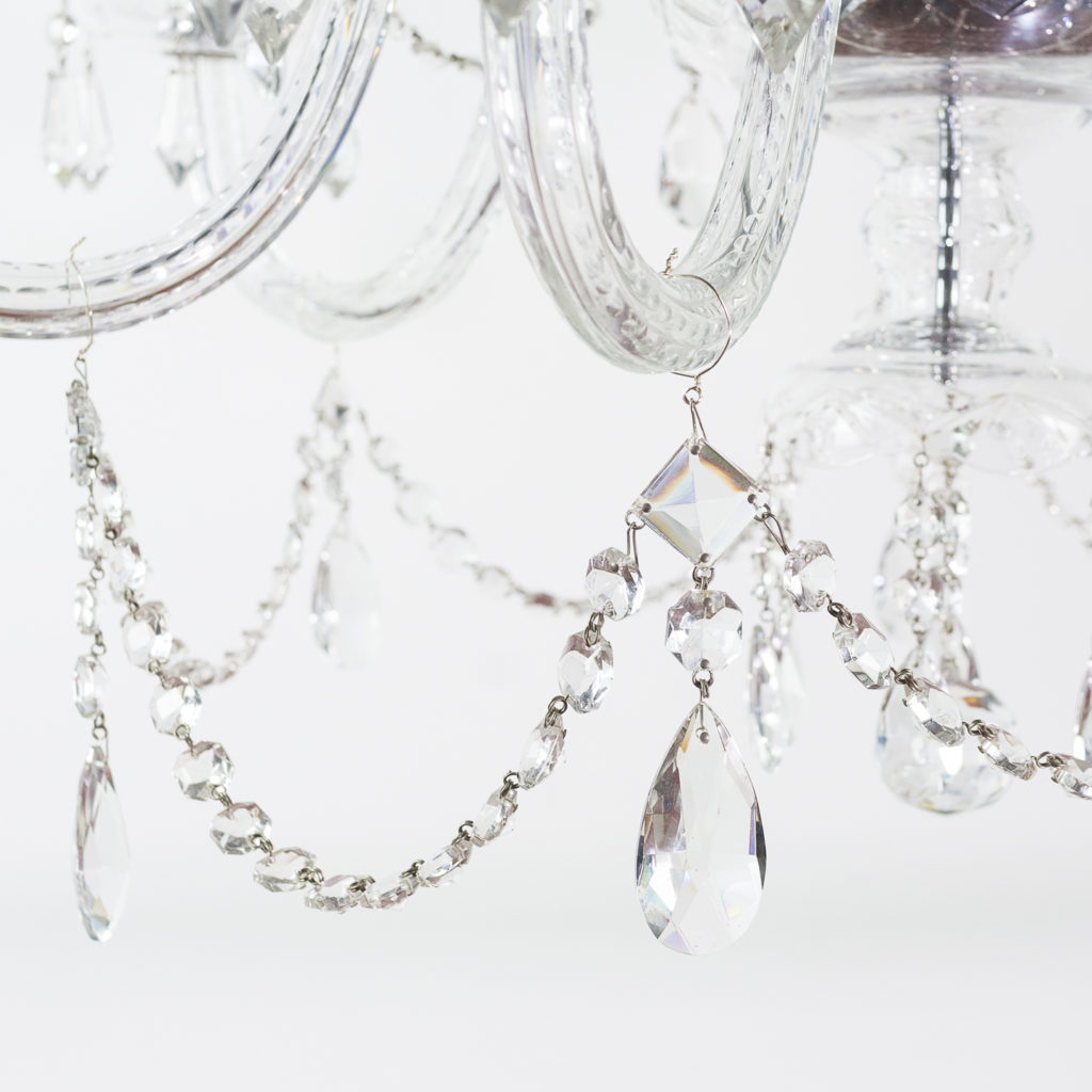 Two twentieth century cut and moulded glass twelve light chandeliers,-131580