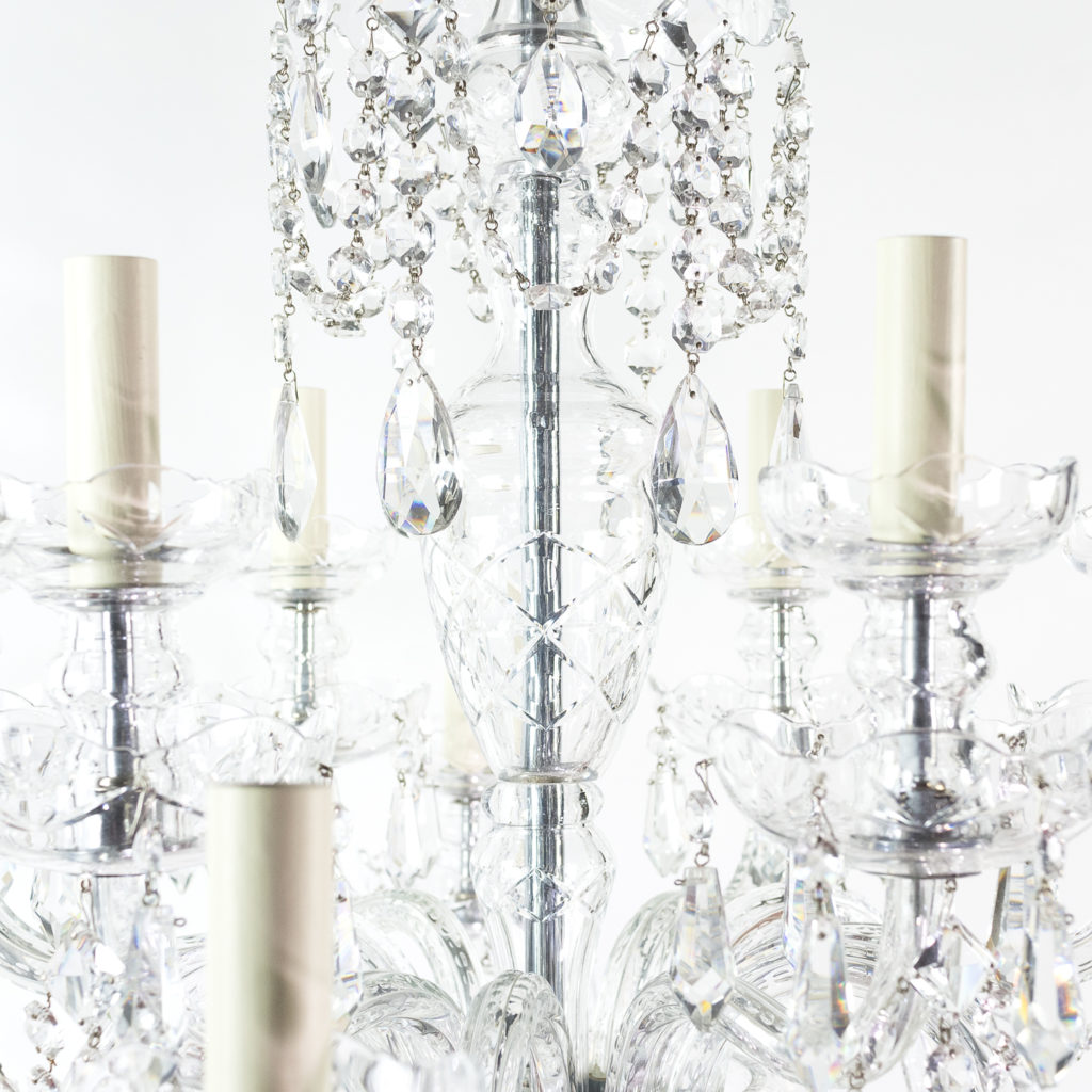 Two twentieth century cut and moulded glass twelve light chandeliers,-131583