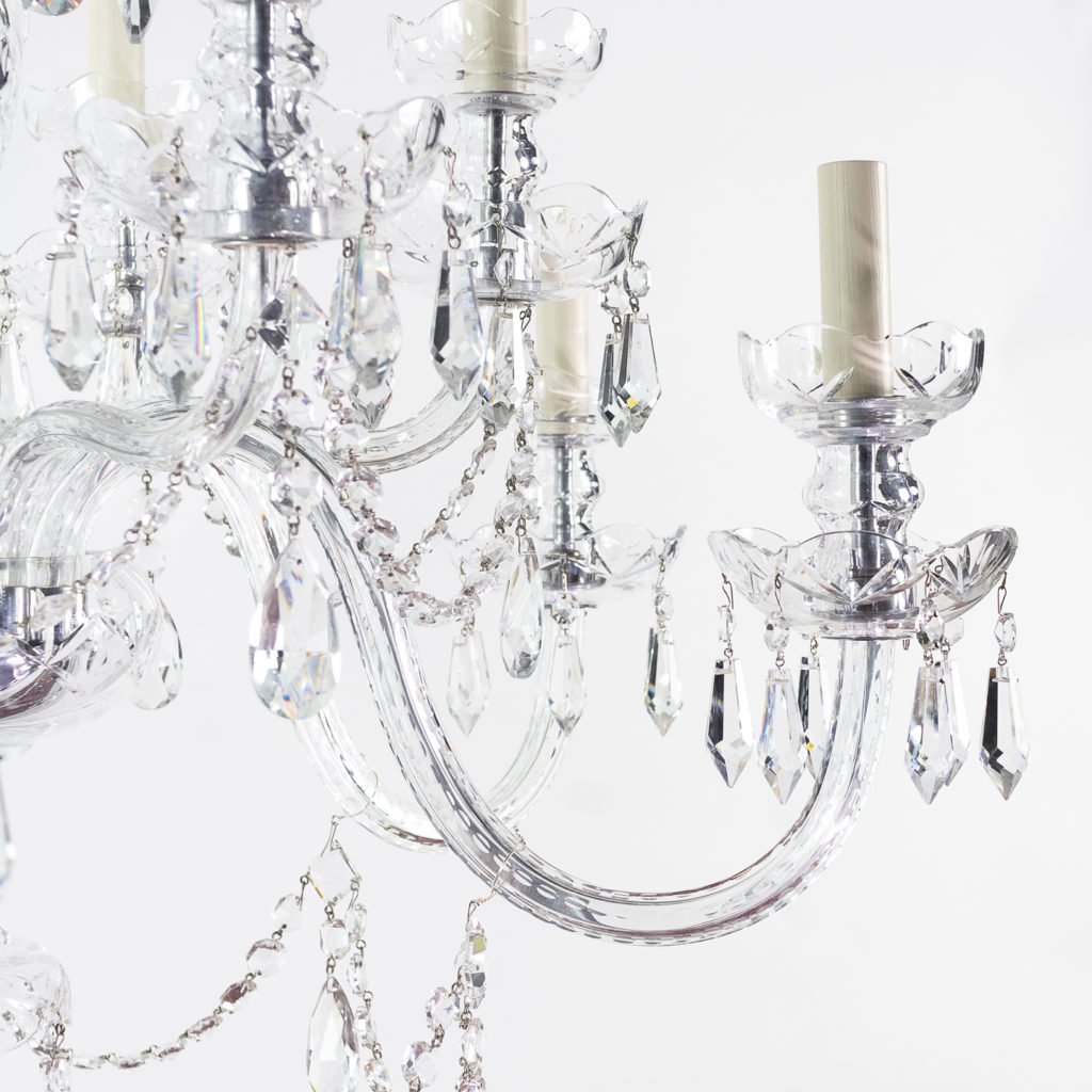 Two twentieth century cut and moulded glass twelve light chandeliers,-131578